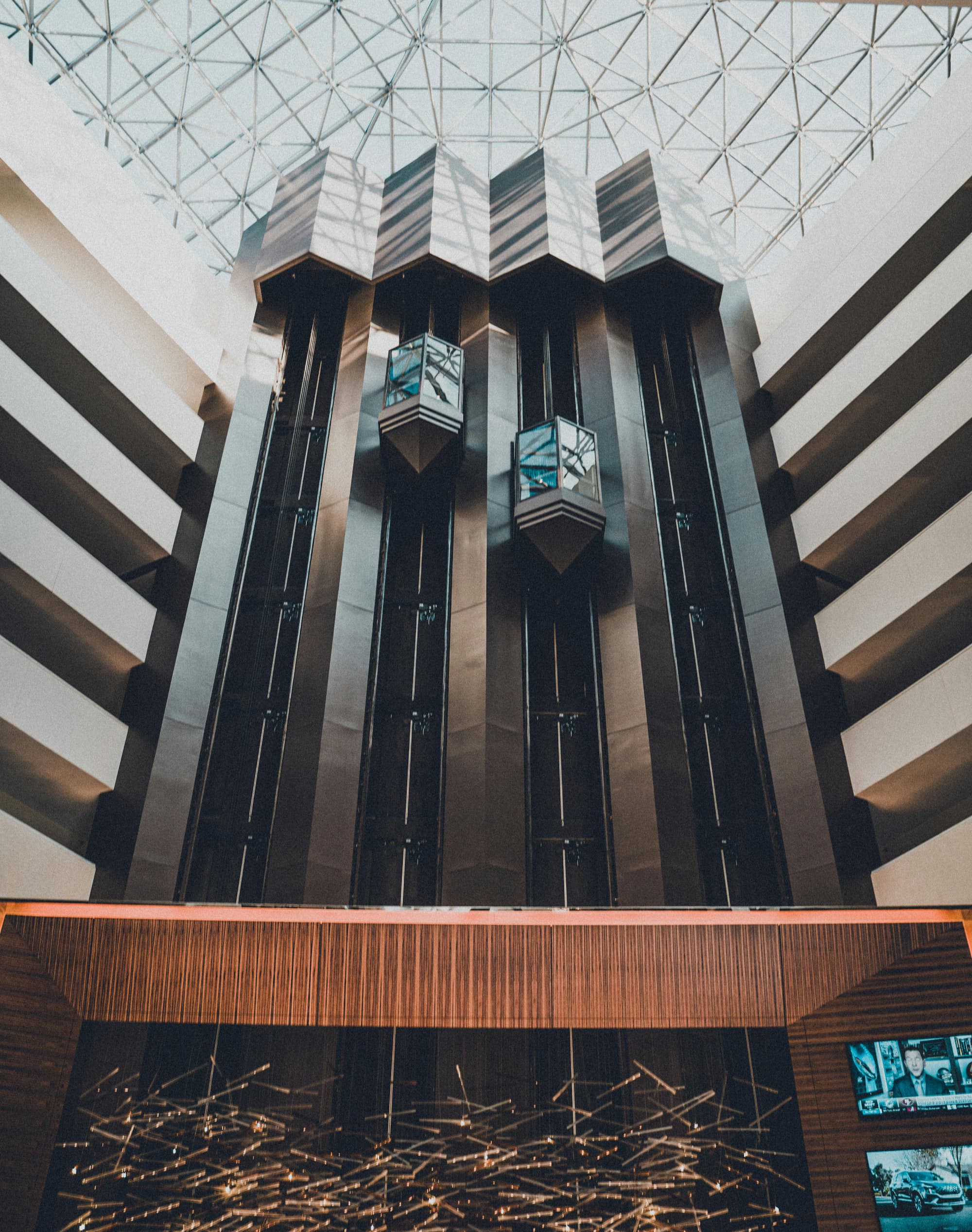 Luxury residential elevator atrium - High-rise apartment elevator solutions for multi-family properties